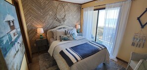 Romantic master suite with ocean views and on-suite