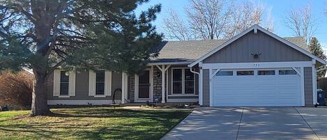 Spacious ranch with two car attached garage and South facing back patio.