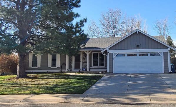 Spacious ranch with two car attached garage and South facing back patio.