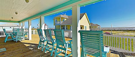 Walk 200 yards to the beach or enjoy the ocean breeze from one of the Capitain's chairs