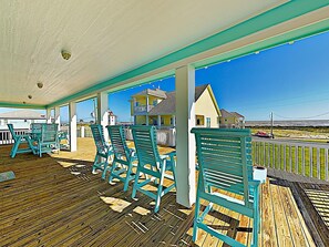 Walk 200 yards to the beach or enjoy the ocean breeze from one of the Capitain's chairs