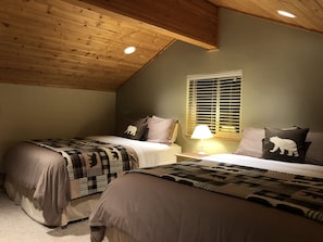 Two queen beds in open loft