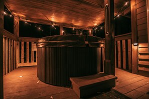 String lights around the hot tub adds a romantic vibe to your night!