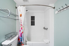 Master Bath offers tub/shower combo large vanity with mirror and hand held shower. Bathroom had been totally remodeled.