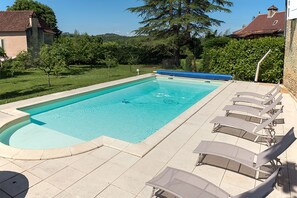 the swimming pool and the organic orchard