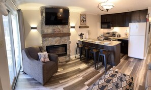 Welcome to Mountain Lodge 104, a renovated 2-bedroom village unit with a fireplace and great slopeside views.