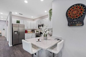 Cozy Kitchen. All our appliances are stainless steel and white cabinets. If you are interested in this property, send us an inquiry!