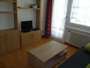 Living room with door to the balcony