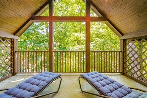 Upper unscreened patio off the master bedroom