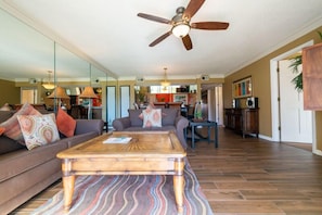Your open floor plan great room offers a queen sized sofa sleeper and matching love seat. The man sized TV has Roku HD Streaming!