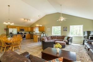 Spacious great room with views of the mountains and slopes, connects to the front upper deck and back deck