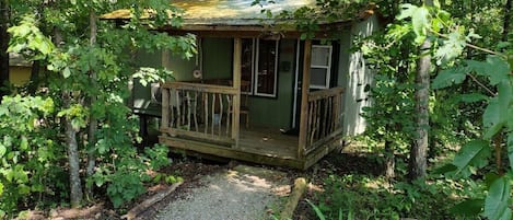 EXTERIOR:  The front of the cabin in the summer.  (Note the "hillbilly-chic" styling. ;-)