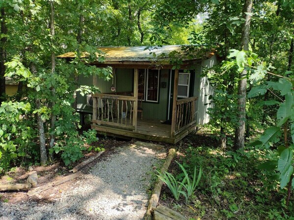 EXTERIOR:  The front of the cabin in the summer.  (Note the "hillbilly-chic" styling. ;-)