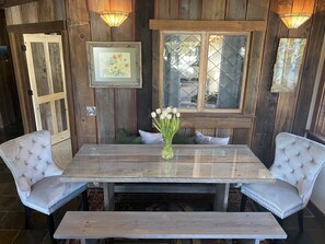 Dining table for 8.  Dad built this rustic barn wood table from local resources.