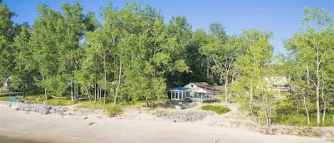 View of small house from beach