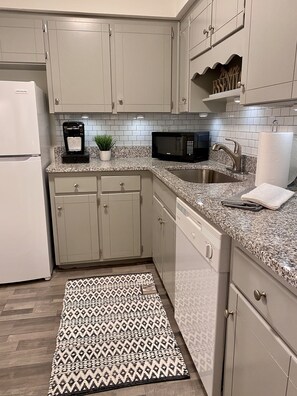 Stocked Kitchen with Washer and Dryer