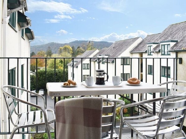 Enjoy breakfast or a glass of wine in the evening looking over the fells.