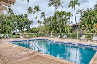 Oceanfront Getaway w/ a Furnished Patio, Shared, Outdoor Pool, & Free WiFi