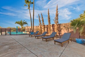 6 Teak Lounge Chairs on large patio/perfect for entertaining 