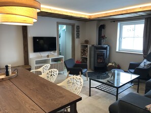 Living/dining area, looking into bedroom 3 (two single beds)