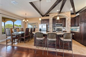 Extra barstools for seating in the kitchen.