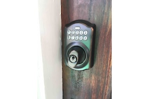 Door to upstairs apartment. You will be provided with the keypad code.