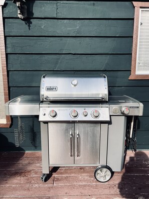 A new BBQ with a side burner! Propane included. 