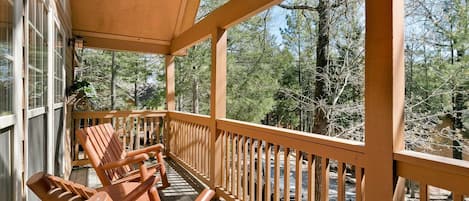 The front porch is the perfect spot to enjoy your morning coffee or enjoy the afternoon sun.