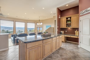 Large kitchen island with four-person bar seating