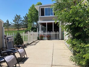 Your apt is thru the picket fence, the covered patio & sliding glass door.