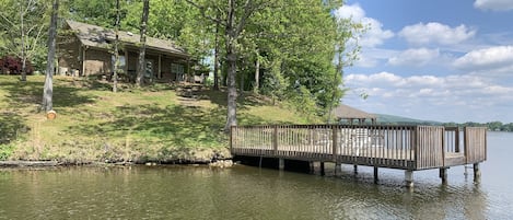 View of the home and swim dock from the lake 