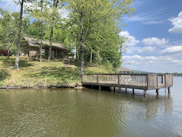 View of the home and swim dock from the lake 