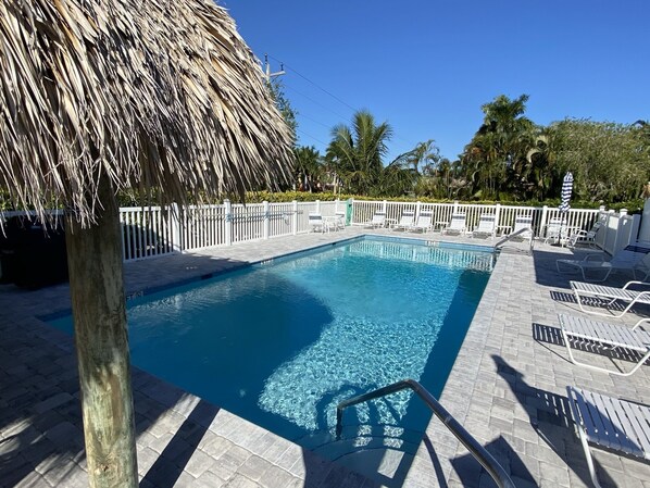 Pool and tiki hut - daytime view