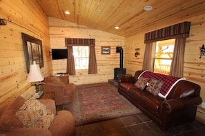 All rooms have ceiling fans and overhead lighting. Kitchen and living room are connected for lots of family "together" space. The living room has a gas fireplace with electronic ignition so you don't have to deal with messy wood or smoke. It pro