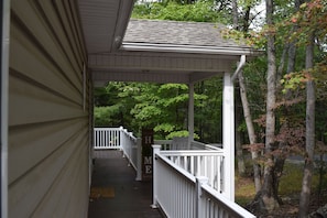 Walkway to portico and entrance to house