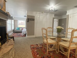 Photo of the cottage from the front door. Fireplace to the left.