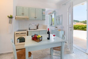 Practical Kitchen and dining area with charming views