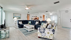 Spacious living room that open into the pool area.