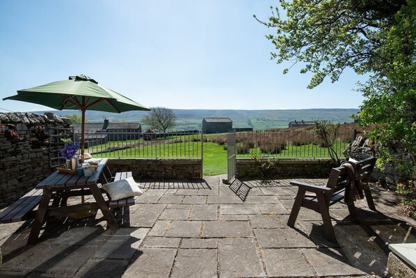 Heatherdene - enclosed front patio with garden furniture and views of the Yorkshire countryside