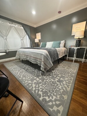 Experience Charming Comfort in this Eclectic Vintage-Modern Suite!” 