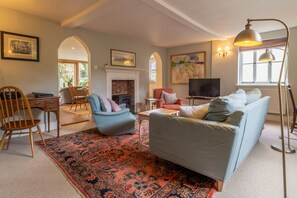 Gothic House Cottage, Clare: Sitting room with electric living flame stove