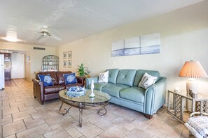 Living Room offers a Love Seat, Sleeper Sofa, and Flat Screen TV