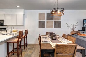 The dining table with seating for 6 guests.