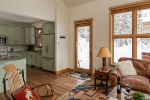 Living room leading into kitchen