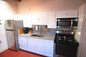 Full Kitchen with modern appliances and hand painted Talavera tiles