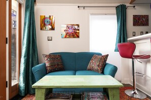 Loveseat in the Patio Cottage — sit and enjoy the patio view!