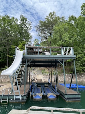 Slide and upper deck jumping spot