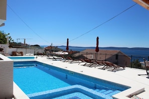 Pool. swimming pool - sun deck-patio-sun beds