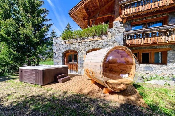 Soothe your muscles either in your own private outdoor hot tub or sauna.