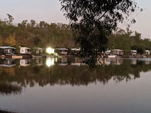 View across the lake to the other bungalows 
